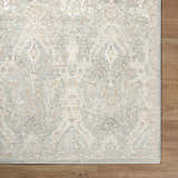 Close-up of Almaas Sage Thick Luxe Area Rug showing farmhouse style pattern and soft ivory, gray, and taupe colors. Corner