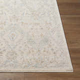Close-up of the Almaas Cream Thick Luxe Area Rug showing its traditional pattern and soft texture on a wood floor. Front