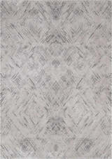 Close-up of the Garza Diamond Textured Washable Rug. Beige rug with a contemporary diamond pattern and subtle gray accents. Design-Rectangle