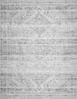 Close-up of the Barny Gray Blue Washable Rug, featuring a traditional, distressed pattern in charcoal and off-white tones. Design-Rectangle