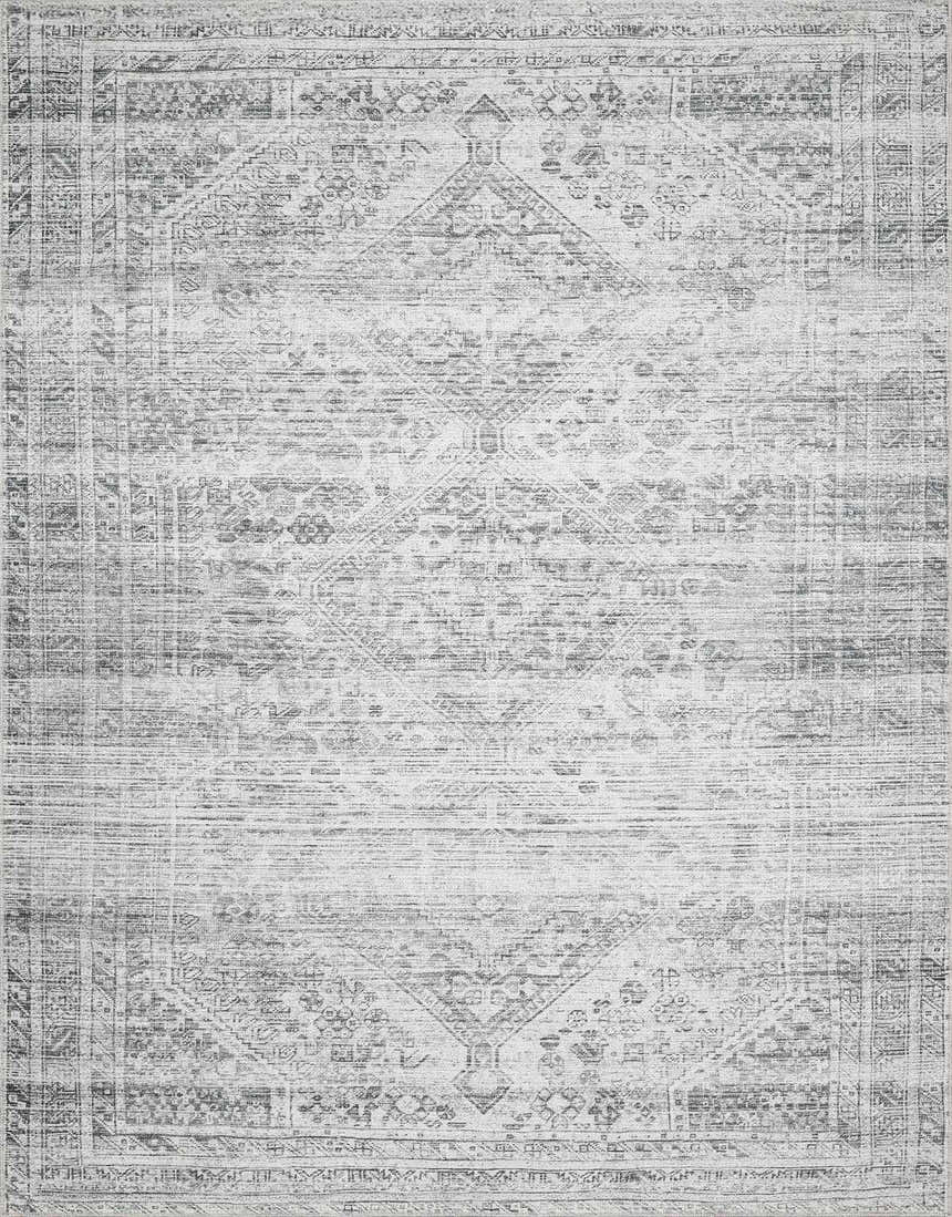 Close-up of the Barny Gray Blue Washable Rug, featuring a traditional, distressed pattern in charcoal and off-white tones. Design-Rectangle