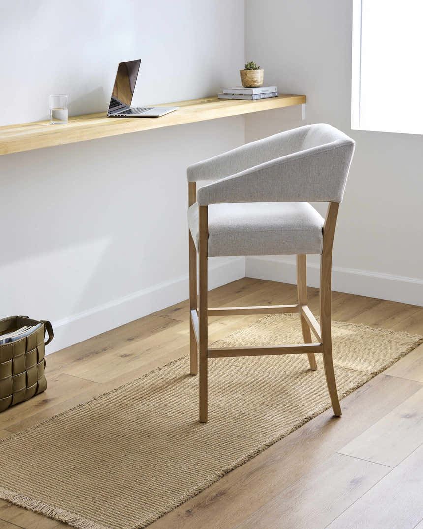Light brown Kimi Becki Owens x LIVABLISS runner rug in a minimalist office with wood floors and a light wood desk. Roomscene-Runner