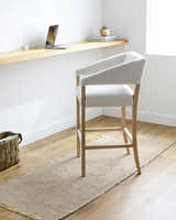Minimalist office with Kimi Machine Woven runner rug in light brown. Jute rug under a modern gray chair. Roomscene-Runner