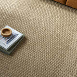 Close-up of the light brown Kimi Machine Woven Becki Owens x LIVABLISS rug showing texture and pattern. Styleshot