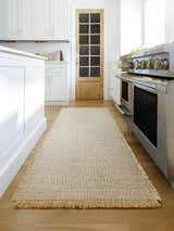 Farmhouse kitchen with white cabinets and Kimi Becki Owens x LIVABLISS runner rug in gray and light brown. Roomscene-Runner