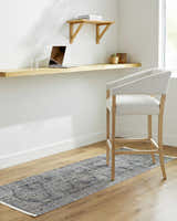 Home office with Margaret Medallion Navy Washable Area Rug, wood floors, desk, and chair. Livabliss x Becki Owens rug. Roomscene-Runner