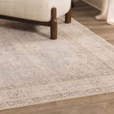 Close-up of the Lila Medallion Denim Area Rug showing its traditional pattern and soft gray, brown, and nutmeg colors. Roomscene-Rectangle