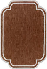 Close-up of the Arnola Brown Outdoor Rug showing its brown woven texture and cream quatrefoil border. Design-Rectangle-537