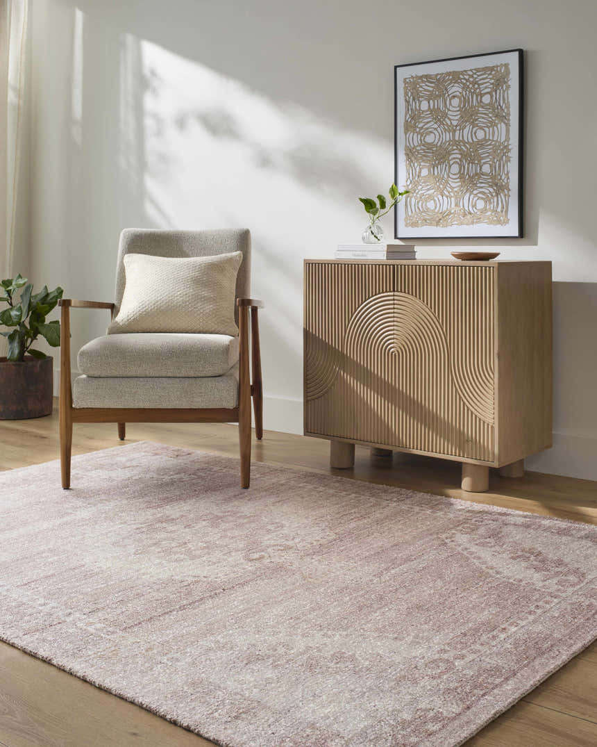 Entryway with blush Alafin Area Rug, light wood cabinet, and gray chair creating a warm, neutral farmhouse style. Roomscene-Rectangle
