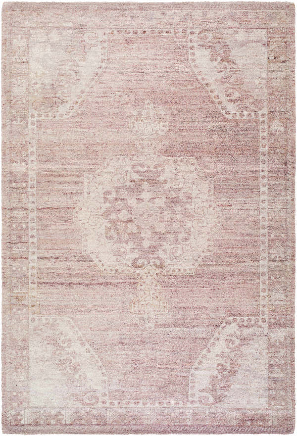 Close-up of the Alafin Area Rug. Hand-tufted polyester rug in blush, cream, dusty rose, and mauve with a traditional design. Design-Rectangle-576