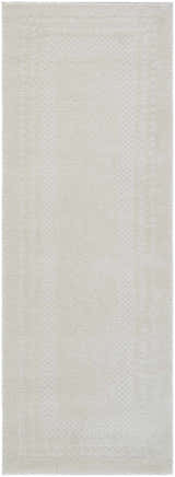Close-up of the ivory Julio Area Rug, showcasing its subtle geometric pattern and soft, textured weave. Design-Runner-273