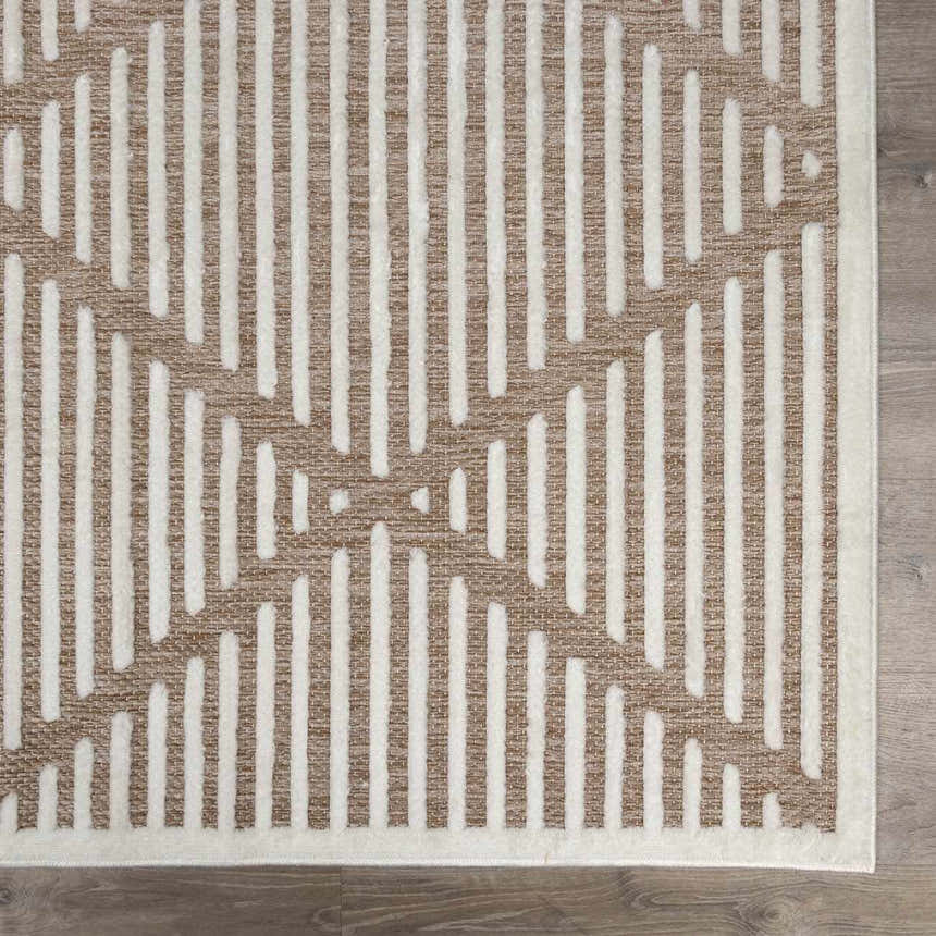 Close up of the Anah Cream Outdoor Rug featuring a geometric striped pattern in bone and nutmeg. Swatch
