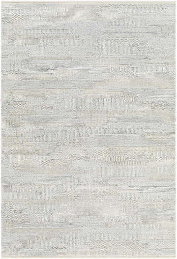 Close-up of the hand woven Ines Area Rug. Cream, light gray, and multi brown recycled PET yarn create a textured design. Design-Rectangle-576