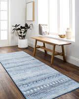 Entryway with Gizeh Arctic Stone Washable Area Rug runner, wood bench, plant, and bright natural light. Farmhouse style decor. Roomscene-Runner