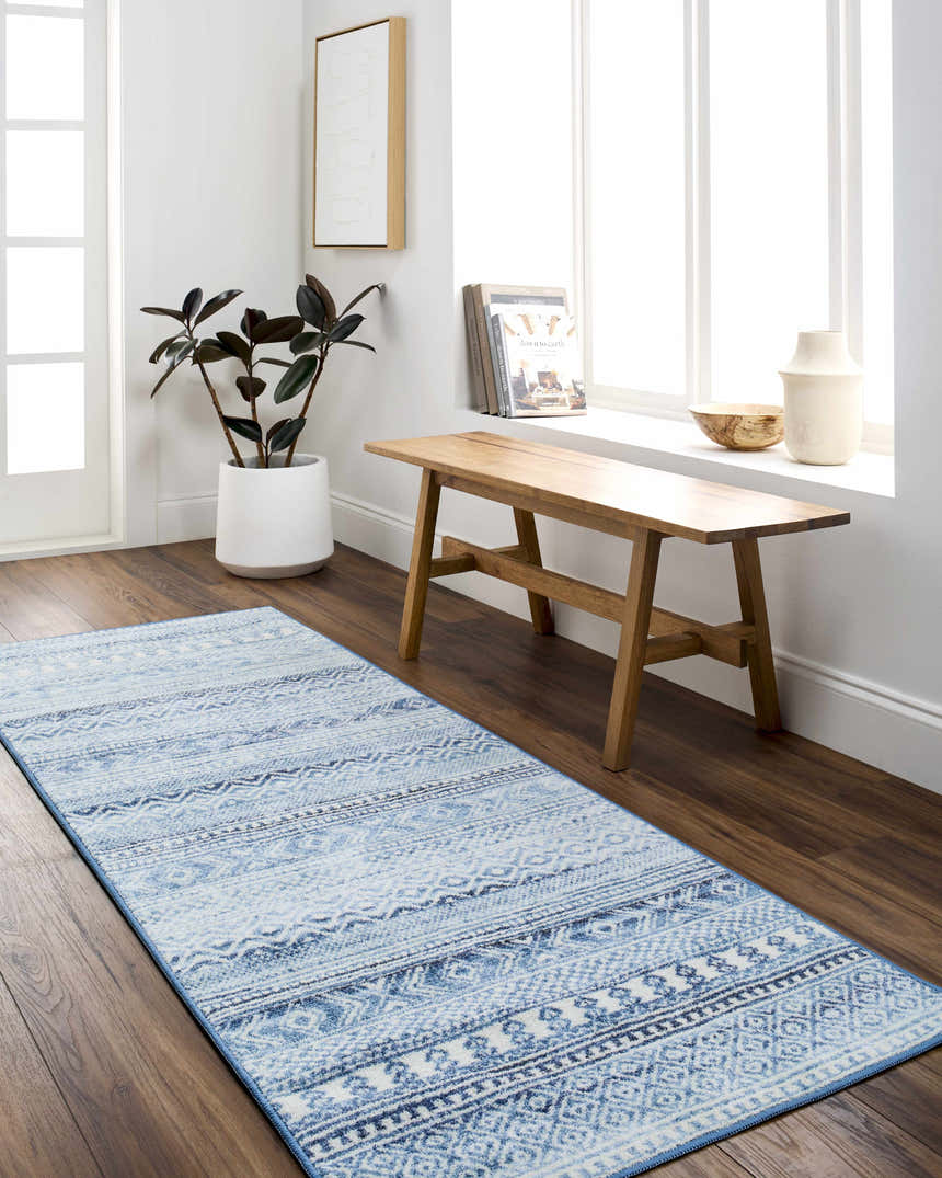 Entryway with Gizeh Arctic Stone Washable Area Rug runner, wood bench, plant, and bright natural light. Farmhouse style decor. Roomscene-Runner