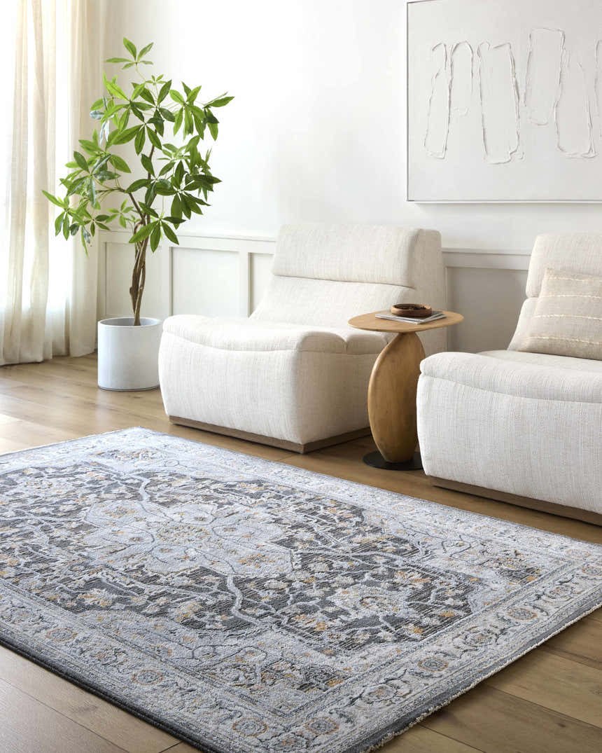 Living room scene with neutral chairs and the gray traditional Hayfa Area Rug. Roomscene-Rectangle