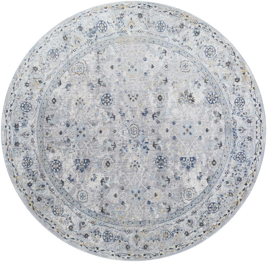 Detailed round Irida Area Rug in dark gray, denim, and light gray with a traditional floral pattern. Design-Round-67