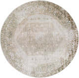 Close-up of a round Gael Boutique Washable Rug. Features light blue, olive, and tan vintage-style pattern. Design-Round-67