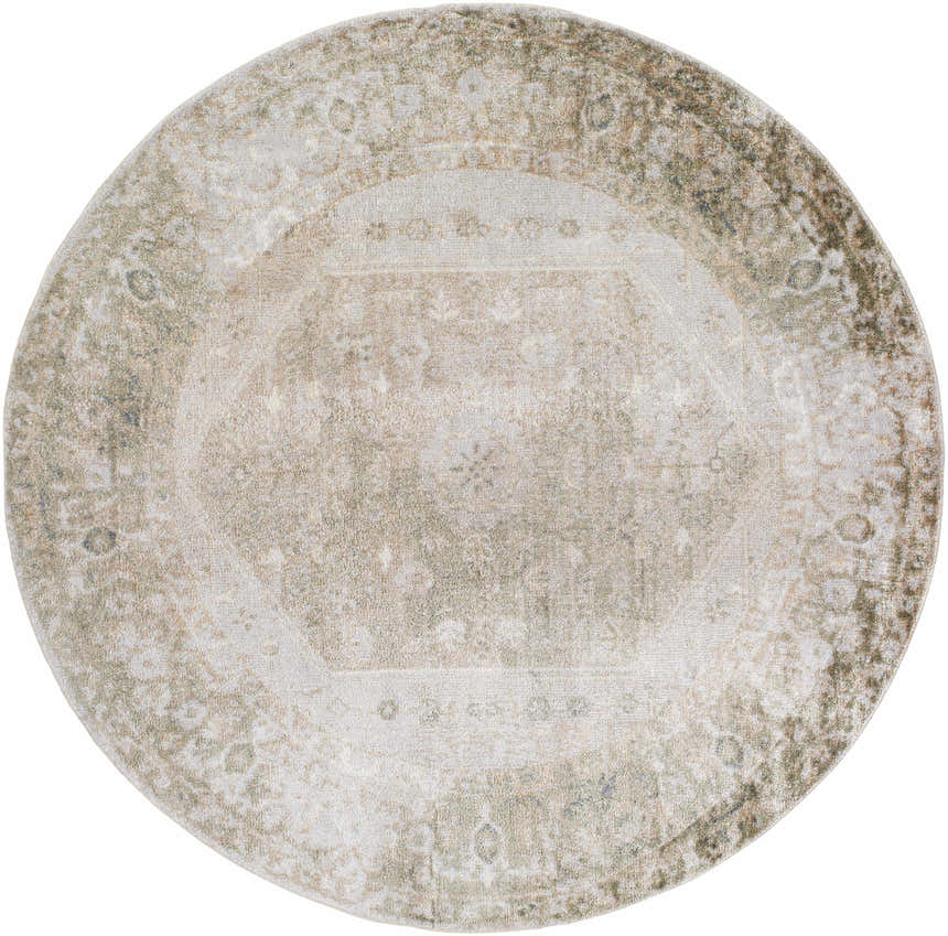 Close-up of a round Gael Boutique Washable Rug. Features light blue, olive, and tan vintage-style pattern. Design-Round-67