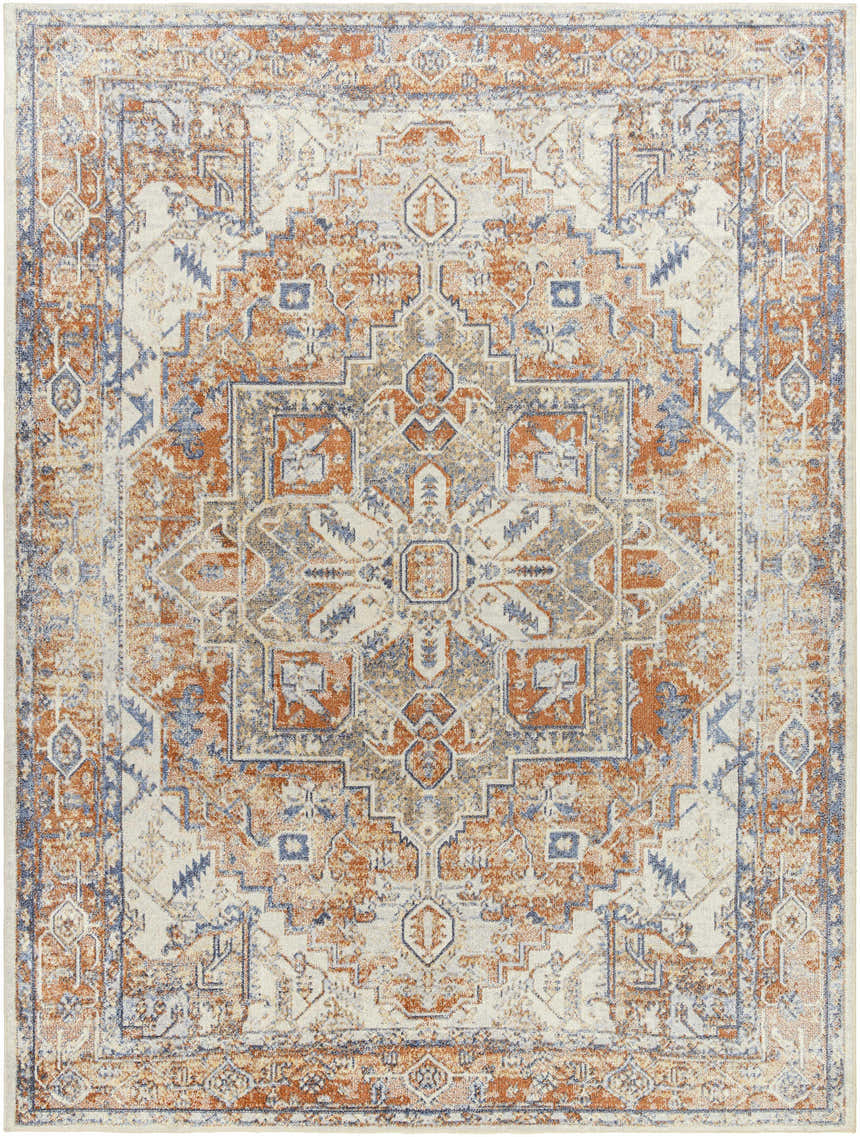 Close-up of the Rust Hera Washable Area Rug. Features a vintage, farmhouse-style pattern in rust, blue, and off-white tones. Design-Rectangle-710102