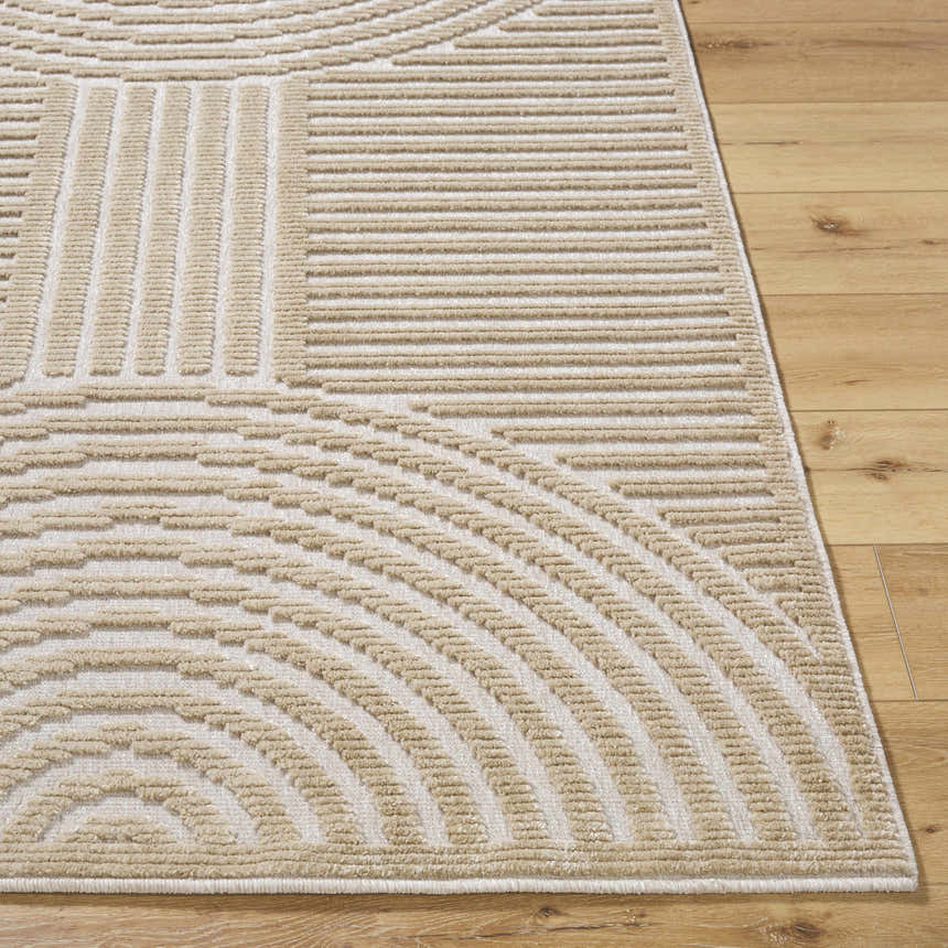 Close-up of the Deron Beige Washable Area Rug. Features a geometric pattern with beige and light brown lines on a cream background. Front