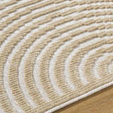 Close-up of Deron Beige Washable Area Rug. Features a contemporary light brown, textured, arched pattern on a beige background. Texture