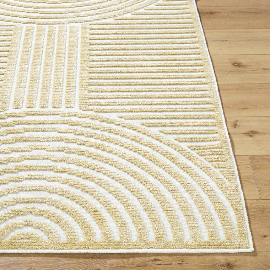 Close-up of the Deron Mustard Washable Area Rug showing its geometric beige and off-white striped pattern and soft texture. Front