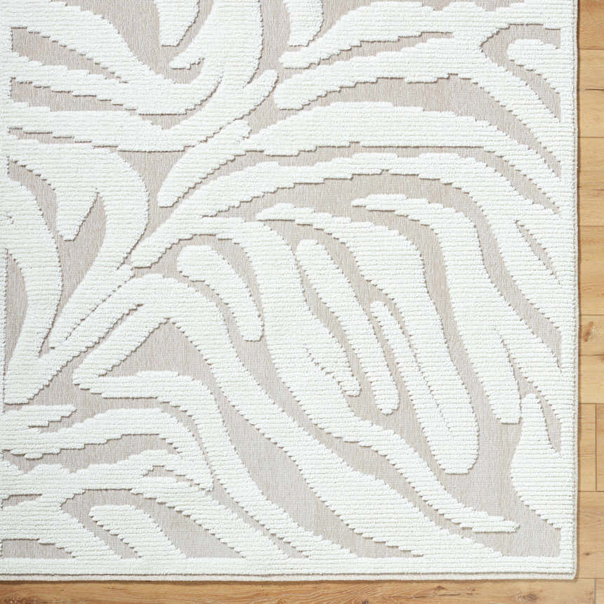 Close-up of the Keto Off-White 3D Washable Area Rug. Features a textured, abstract pattern in off-white and light gray. Contemporary style. Corner