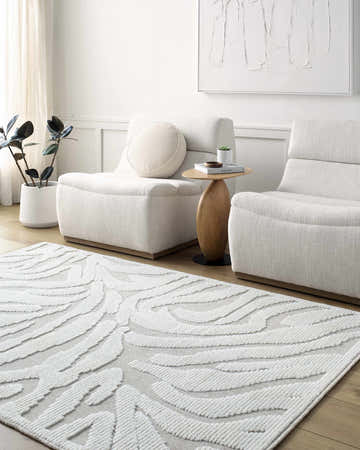 Contemporary living room with Keto Off-White 3D Washable Area Rug, modern chairs, wood side table, and neutral decor. Roomscene-Rectangle