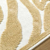 Close up of Keto White Washable Area Rug showing mustard and white contemporary design. Texture