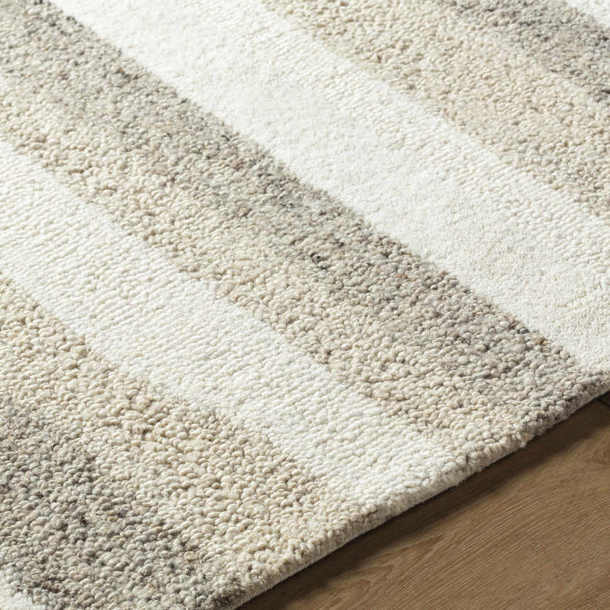 Close-up of the hand-tufted Siaju Taupe Area Rug. Features a textured, striped pattern in neutral taupe and white wool. Texture