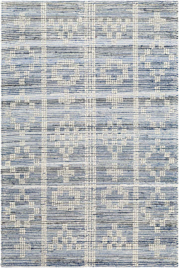 Close up of the hand woven Suna Area Carpet with a light blue, navy, and off white bohemian pattern. Design-Rectangle-576