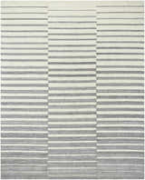 Close-up of the Gawel Gray Area Rug. Hand-tufted wool rug with a contemporary stripe pattern in gray, light gray, and charcoal. Design-Rectangle-810