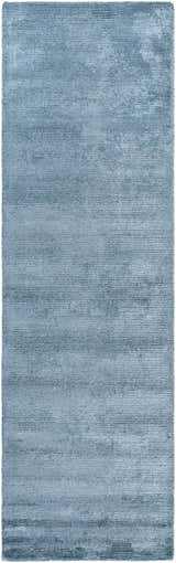 Close-up of the gray Nuray Area Rug, hand-tufted with a subtle horizontal pattern and soft, viscose texture. Design-Runner-310