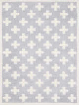 Close-up of Satu Blue Area Rug featuring a light gray plus sign pattern on a gray shag texture. Design-Rectangle