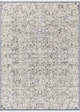 Close-up of the Haran Cloud Gray Area Rug. Features a farmhouse-style pattern in cloud gray, medium gray, and subtle blue tones. Design-Rectangle-57