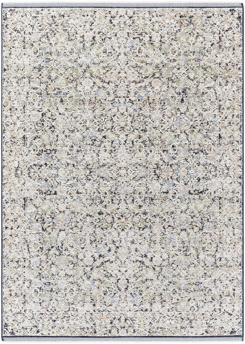 Close-up of the Haran Cloud Gray Area Rug. Features a farmhouse-style pattern in cloud gray, medium gray, and subtle blue tones. Design-Rectangle-57