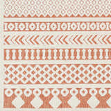 Close-up of the Jove Orange Outdoor Rug, featuring a bone and terracotta Southwestern geometric pattern. Swatch