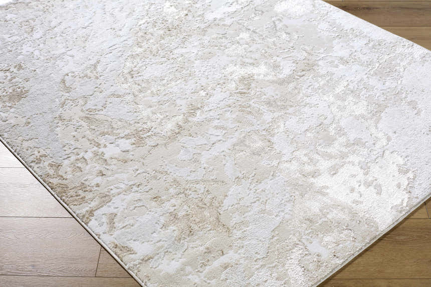 Close up of the Jaren Tan Area Rug showing its beige, cream, and tan contemporary design. Corner
