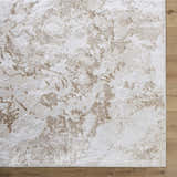 Close up of the Jaren Tan Area Rug showing beige, cream, and tan abstract pattern and texture. Corner