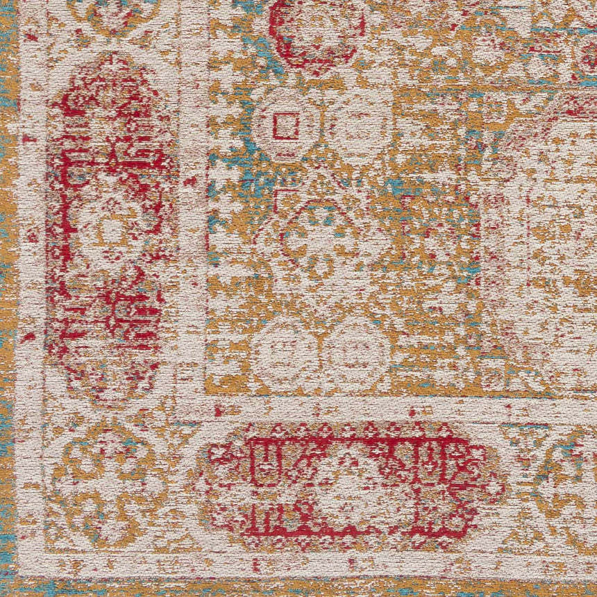 Close-up of Wrangell Mustard/Red Damask Carpet Area Rug showing its chenille texture and bohemian-inspired damask pattern. Swatch