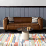 Living room scene with a brown leather sofa and Southfields Colorful Modern Area Carpet. Roomscene-Rectangle