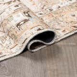 Close-up of the Standon Vintage Flat Pile Washable Rug showing its traditional design, texture, and colors like blue and terracotta. Fold