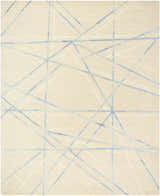 Close-up of Hiba Area Rug. Beige wool rug with a modern geometric pattern of slate blue and bone lines. Hand-tufted texture. Design-Rectangle-810