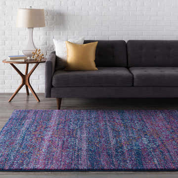 Living room scene with Stonewall Area Rug in navy, teal, burgundy, and burnt orange colors. Roomscene-Rectangle