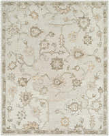 Close-up of the Adelle Tufted Oushak Area Rug. Beige wool rug with a traditional floral pattern in tan and brown. Hand-tufted texture. Design-Rectangle-810