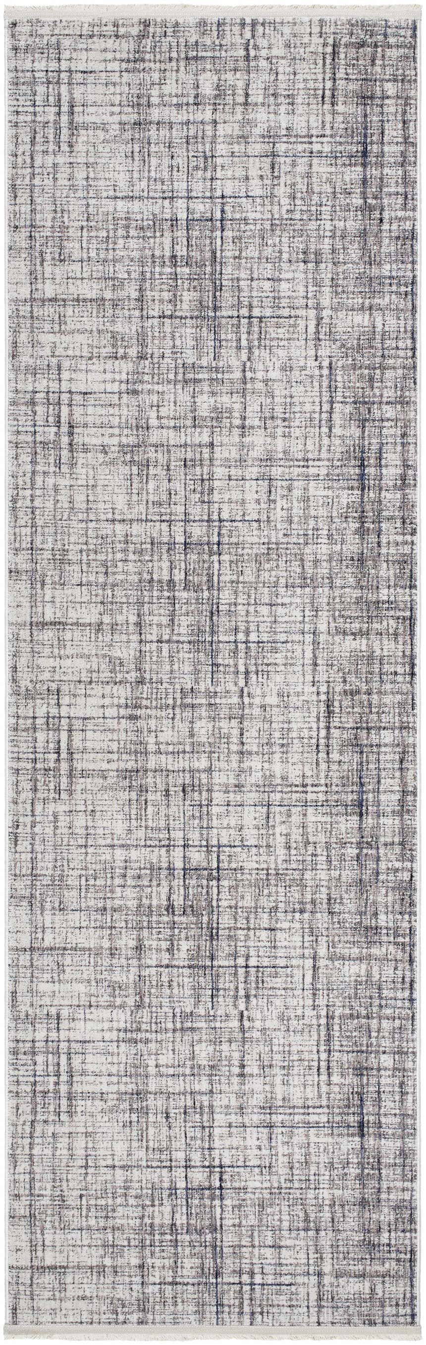 Close-up of the Taysan Area Rug showing a modern, abstract pattern in dark gray, purple, taupe, and mocha. Design-Runner-3270