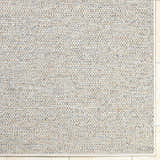 Close-up of the Thanh Ivory Area Rug showing its woven texture with ivory, gray, and sandstone colors. Corner