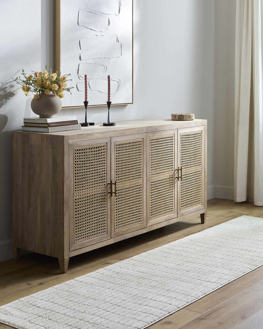 Entryway scene with a Cascade White Area Rug runner in front of a wood cabinet with a vase of flowers. Roomscene-Runner