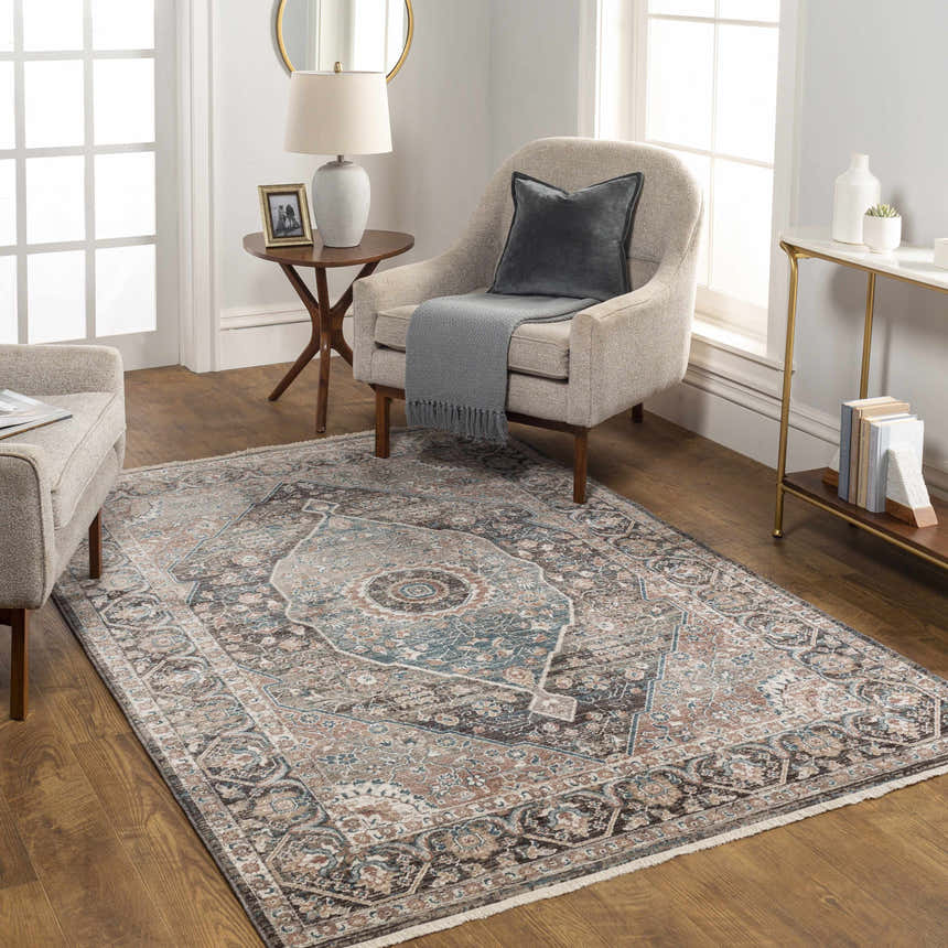 Living room scene with a Baychester Brown Area Rug, beige armchairs, and wood floors. Roomscene-Rectangle